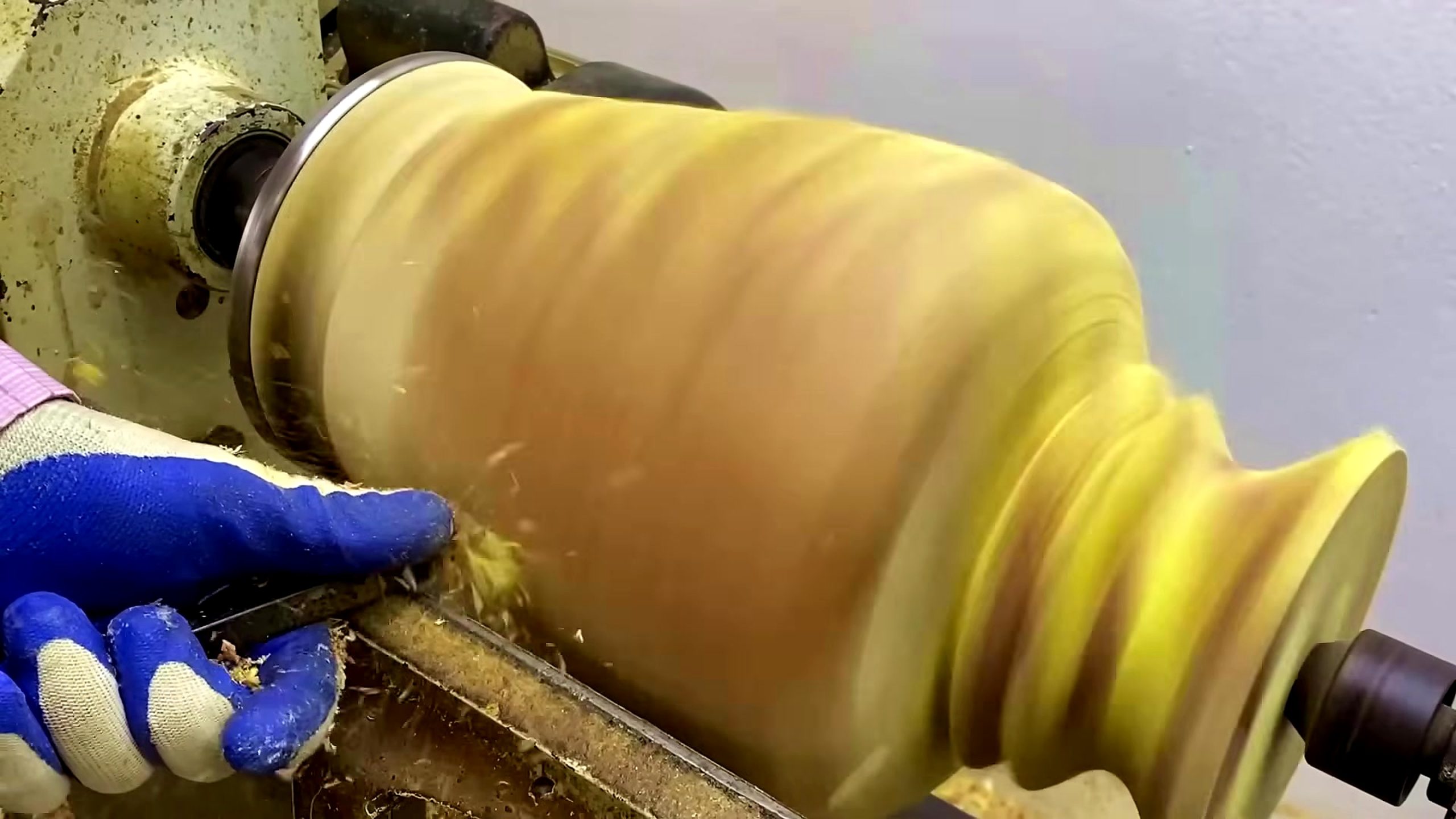 carpenter wooden shape forming process - surface refinement after the main shape has been created