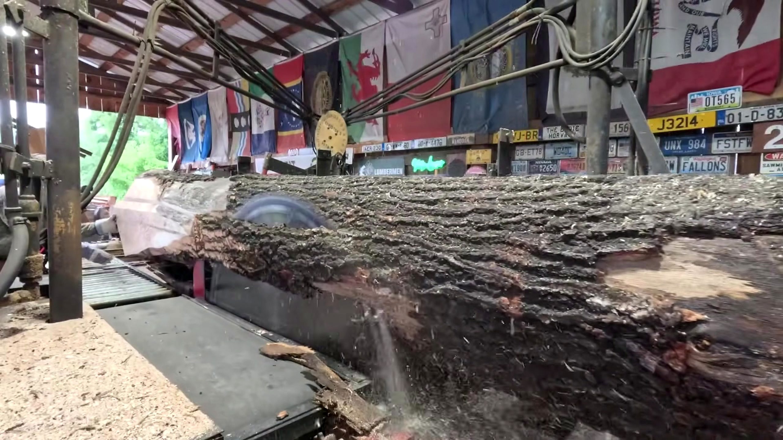 happy 4th july sawing big red log - the setup or early workflow visible in the source video