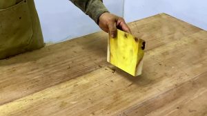 laminated wood bowl turning process - contrasting laminated stock being prepared on the bench before machine shaping