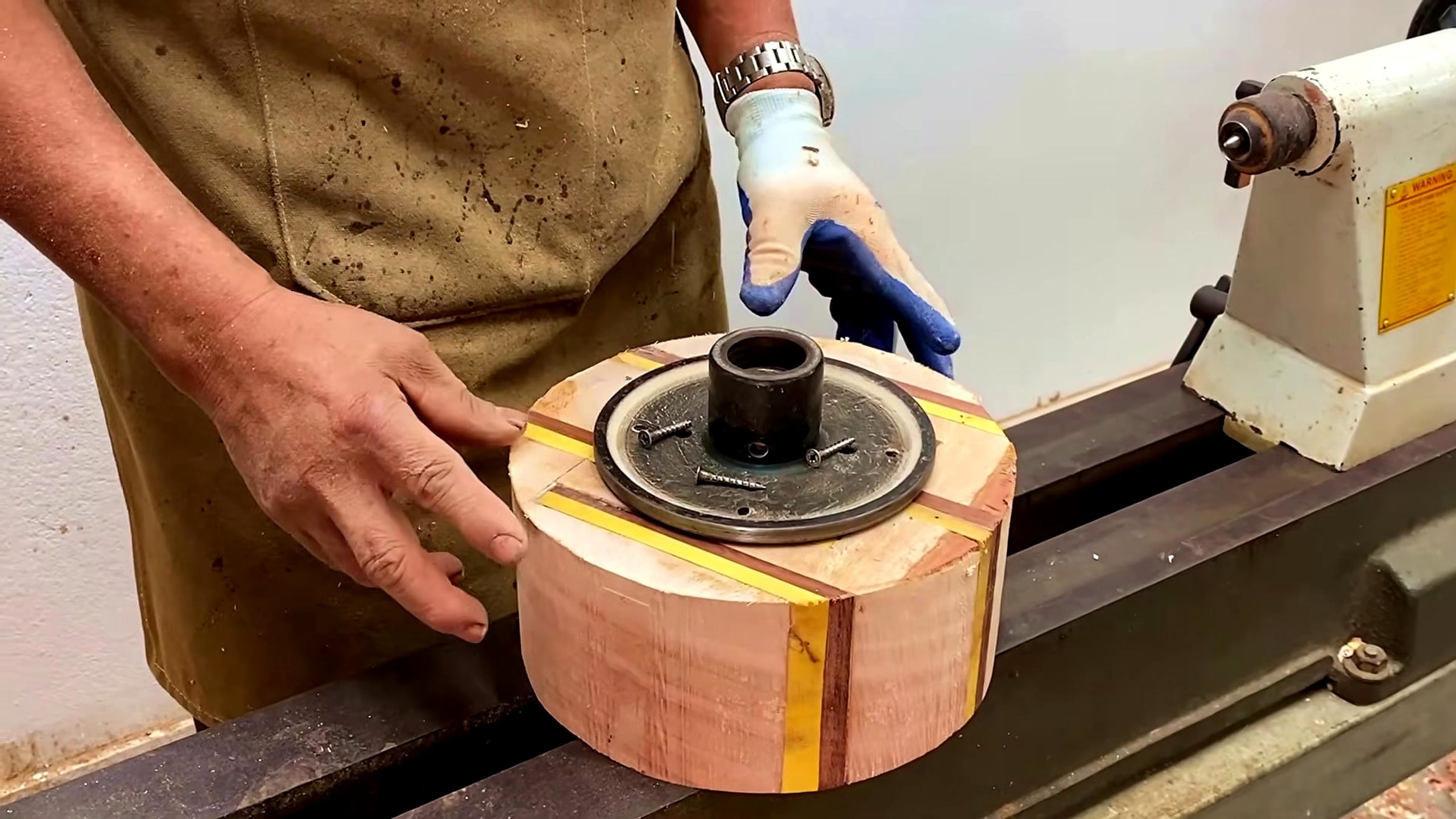 let make pieces wood valuable ways - laminated round woodturning blank mounted near the lathe with faceplate hardware