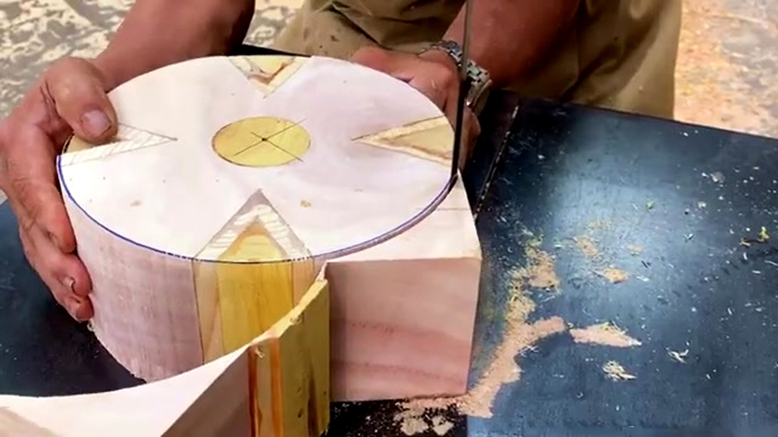 patterned wood lathe bowl process - contrasting triangular inserts reviewed around the circular blank before turning