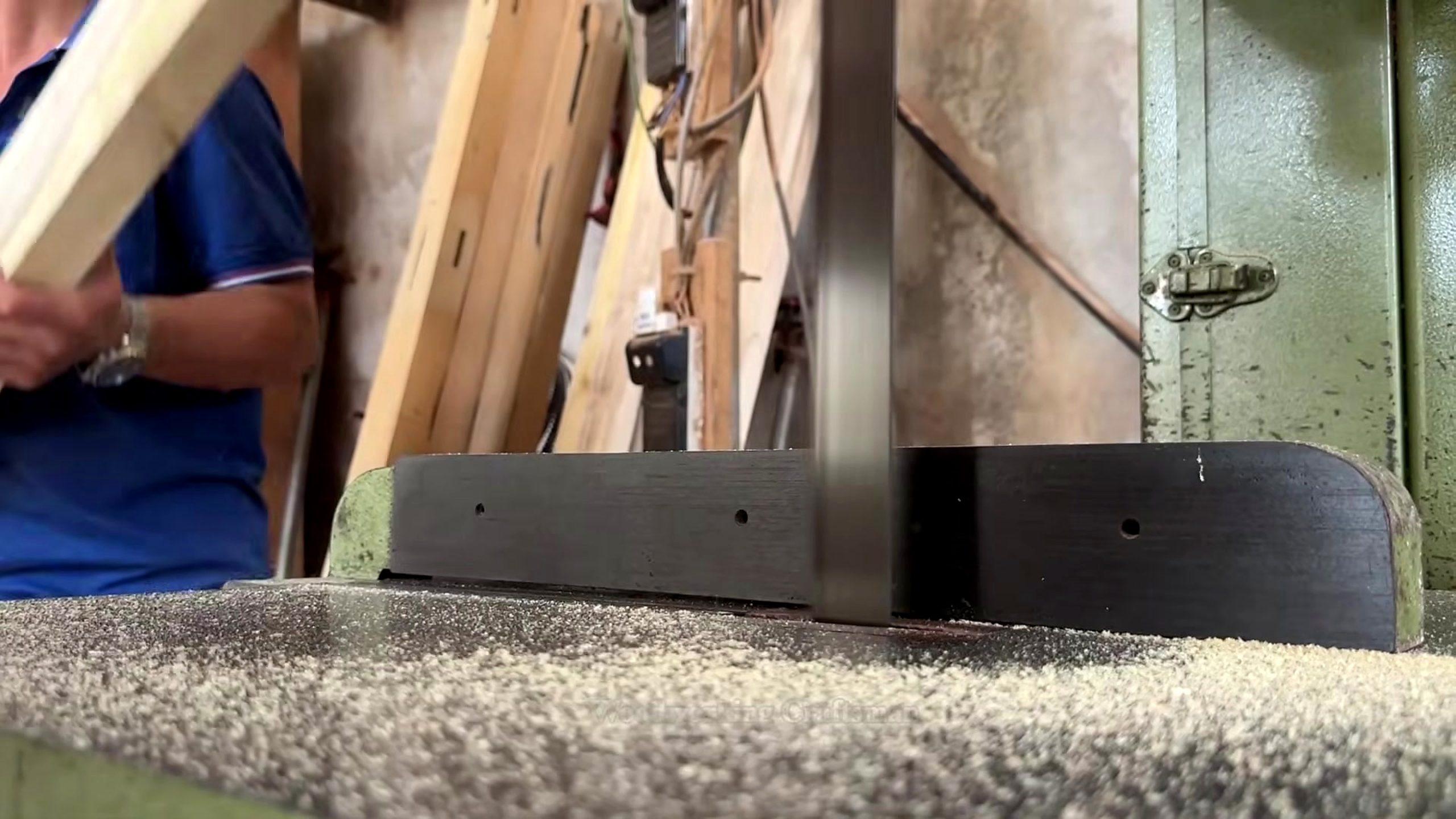 see guy did cherry wood logs board cutting stage for a small wooden house