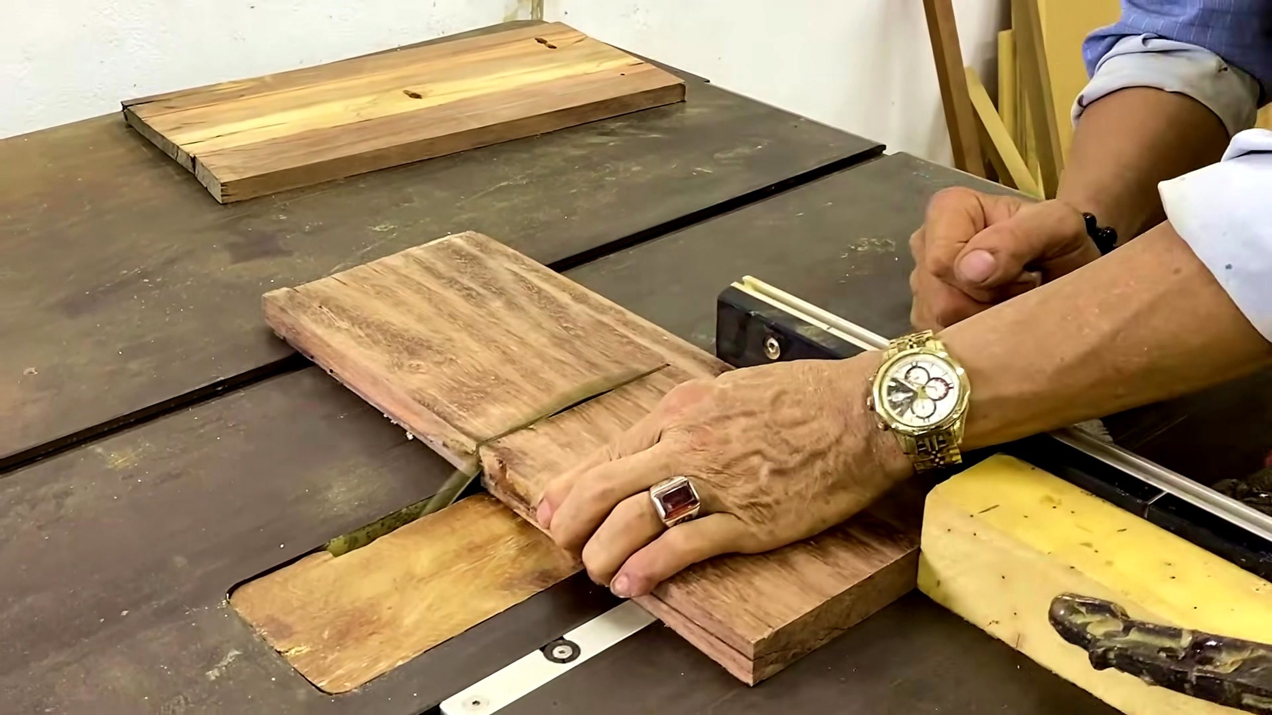 segmented wood lathe bowl process - a table saw trimming a contrasting board or blank component