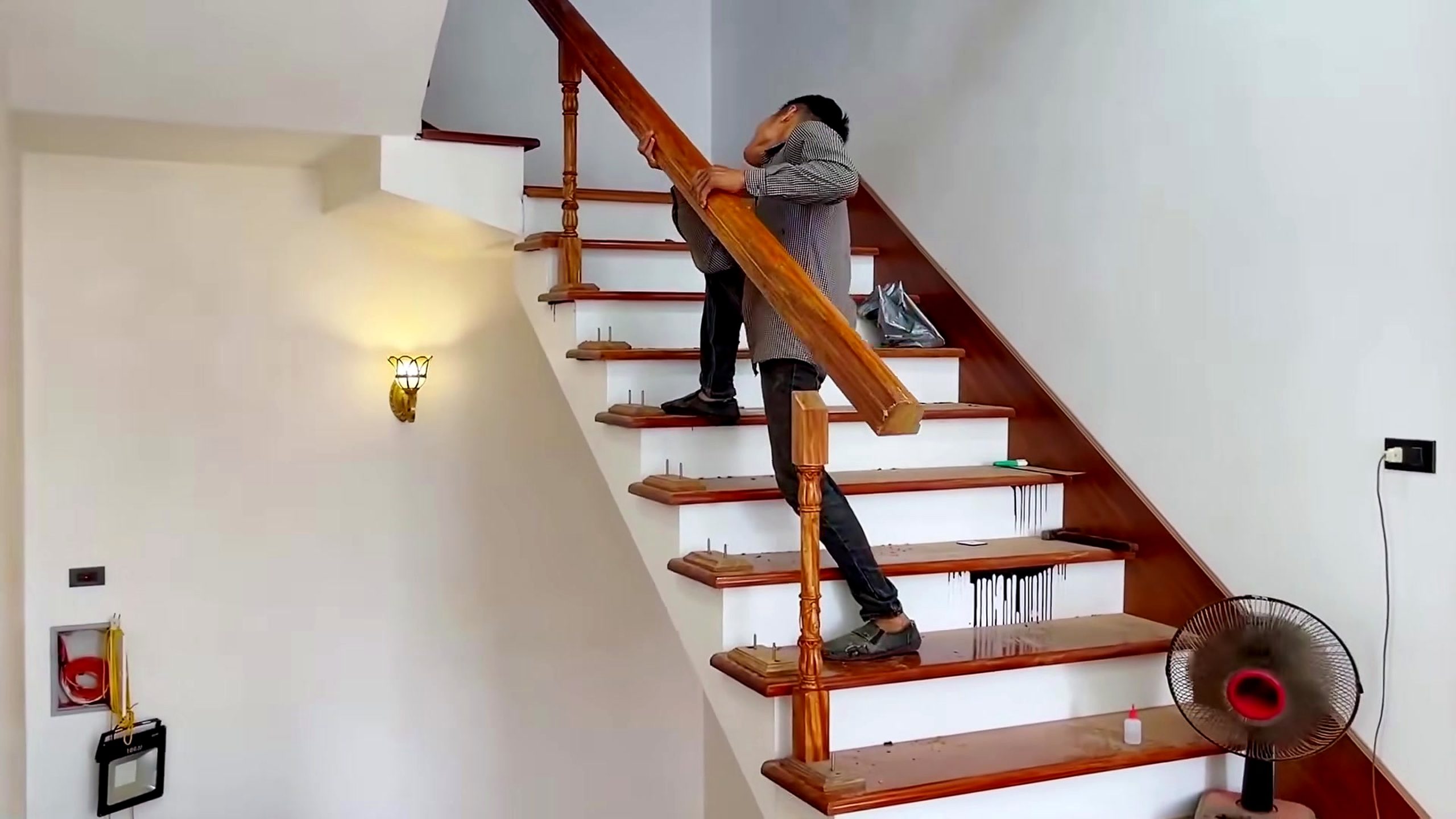 stunning curved wooden staircase showcases highest - a detail-check moment that helps readers inspect the process