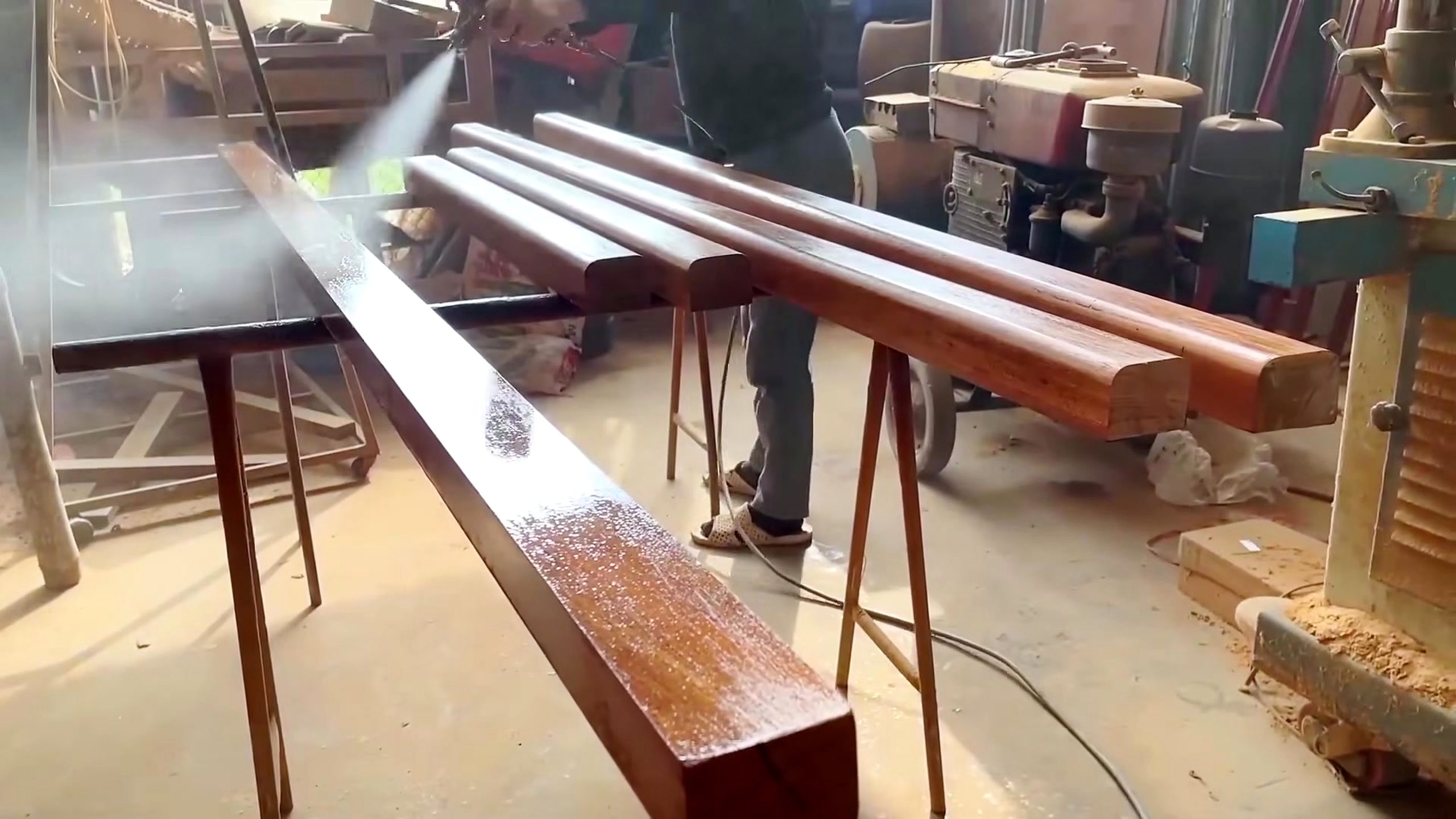 woodworker builds installs wooden stair railing - the main work stage that carries the video's practical lesson