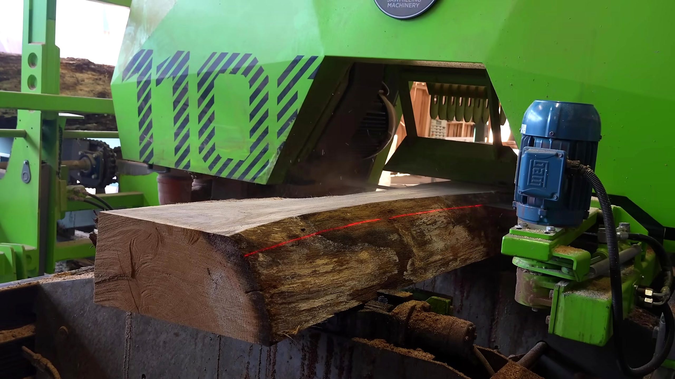 cutting huge oak logs planks roof sawmill - a detail-check moment that helps readers inspect the process