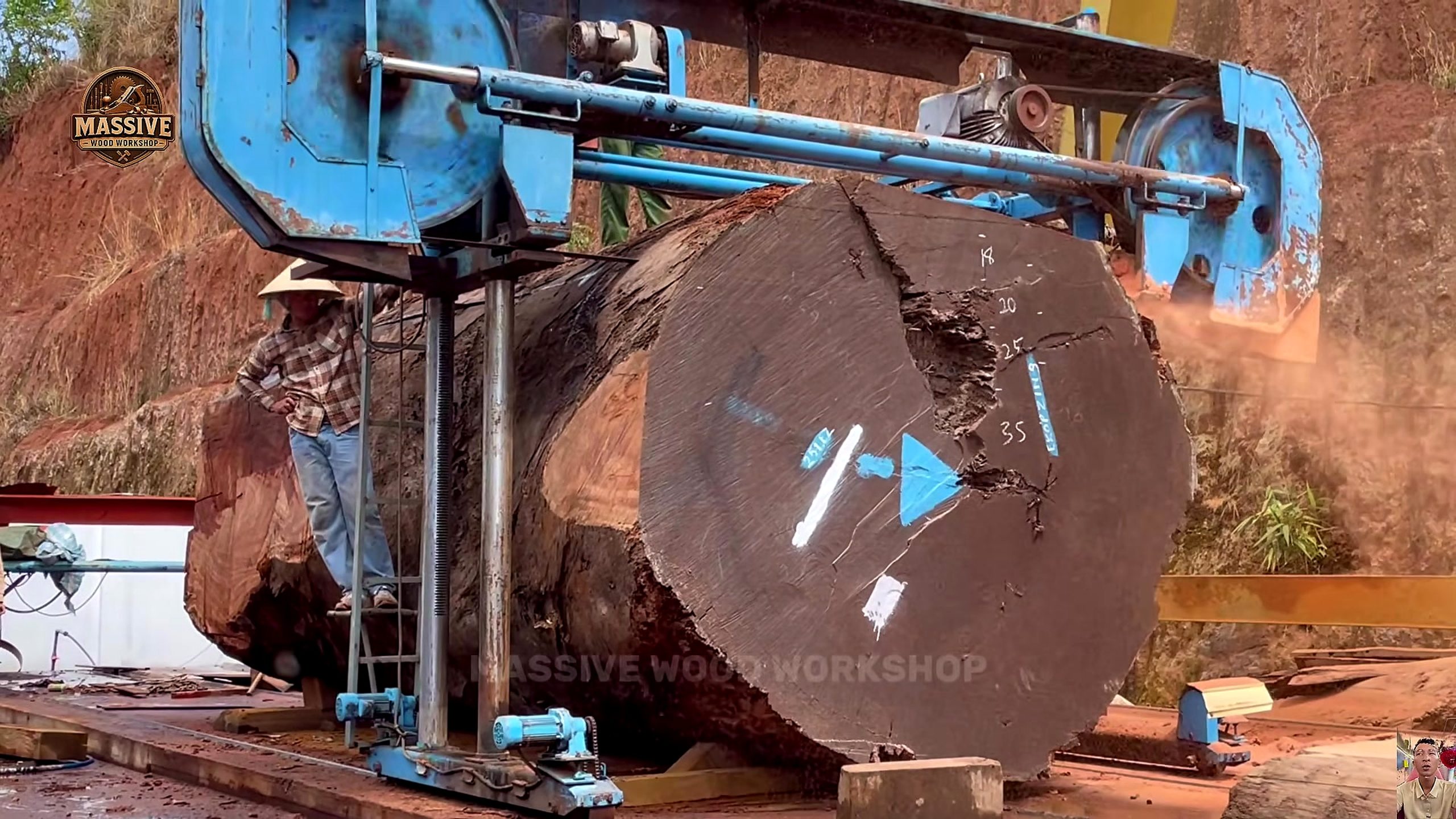 giant timber bandsaw round table process - the vertical bandsaw opening a supported end face