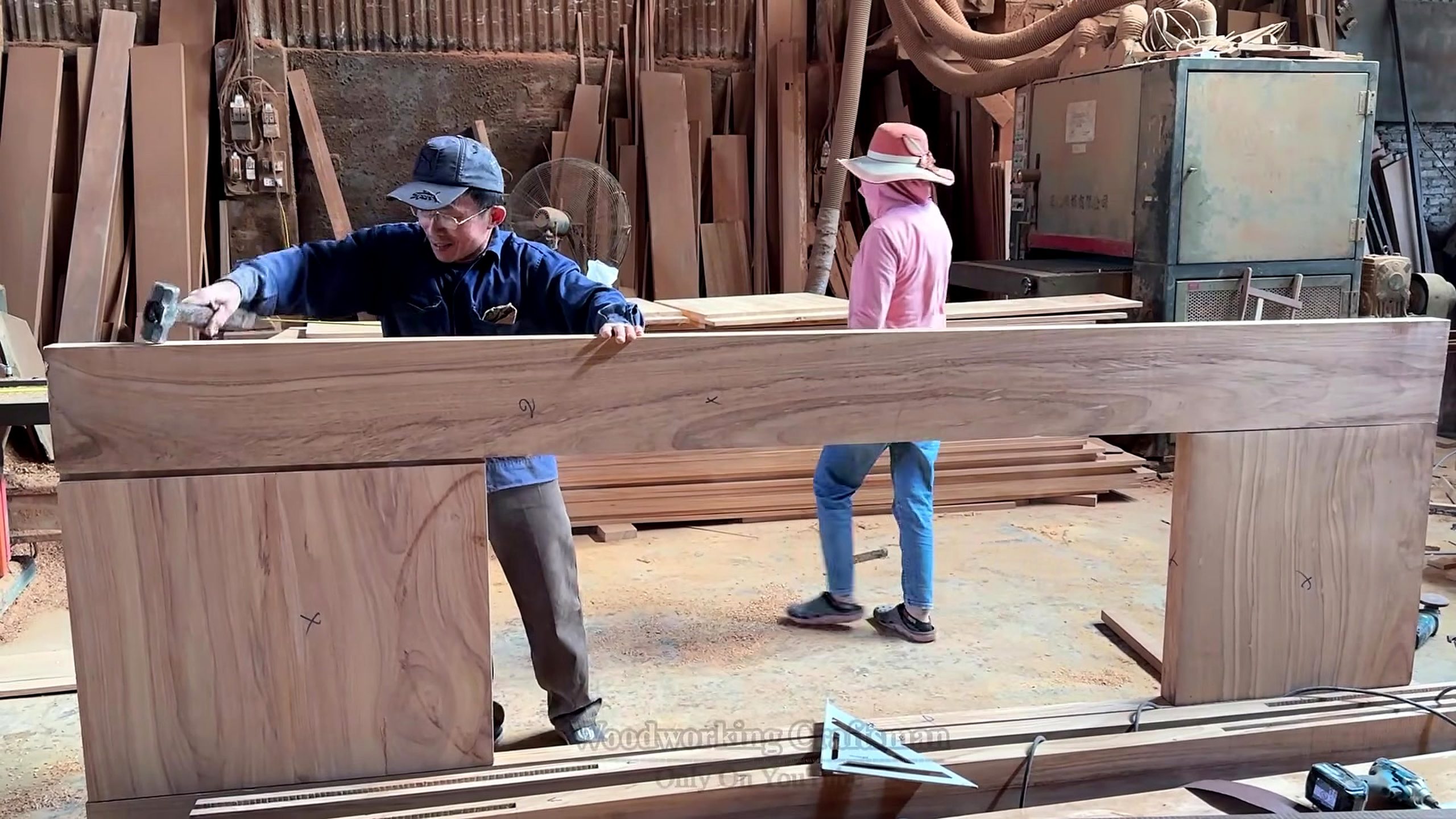 giant wooden door handcrafted installation process - layout, joining, or frame-panel preparation for the oversized wooden door