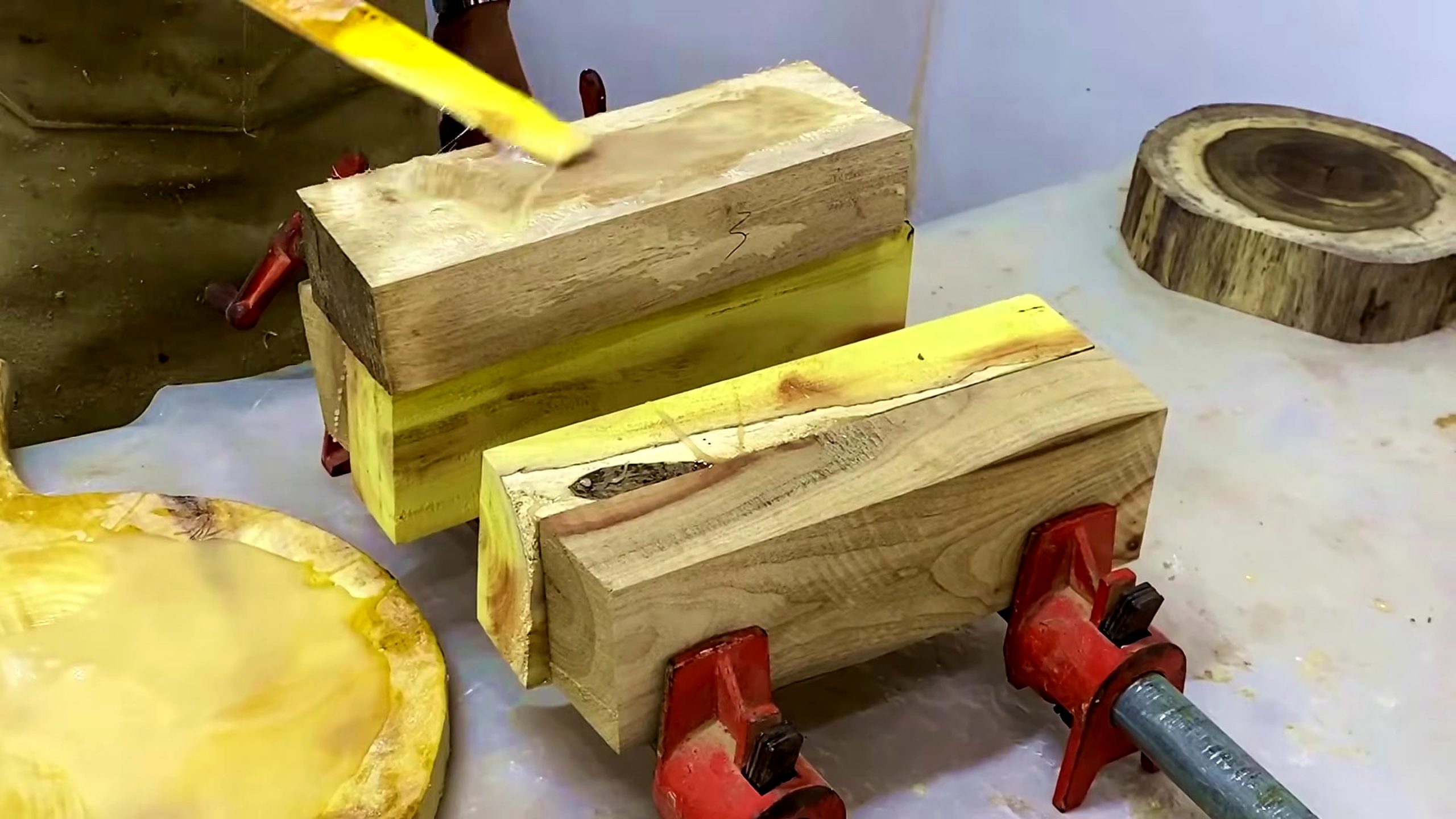 homemade wood lathe bowl process - a clamped wood block being prepared before lathe mounting