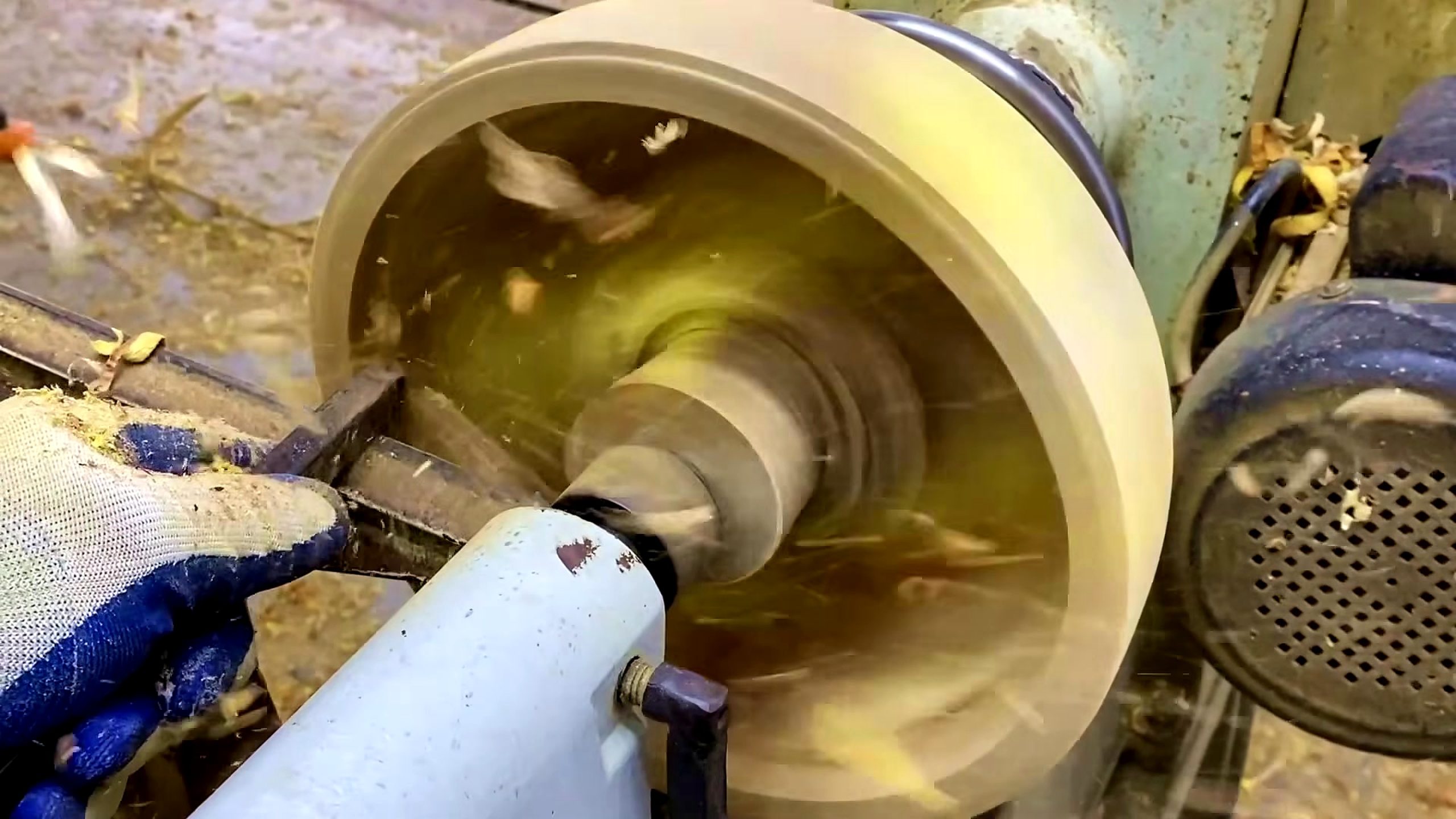 homemade wood lathe bowl process - the tool entering the rotating bowl form for controlled hollowing