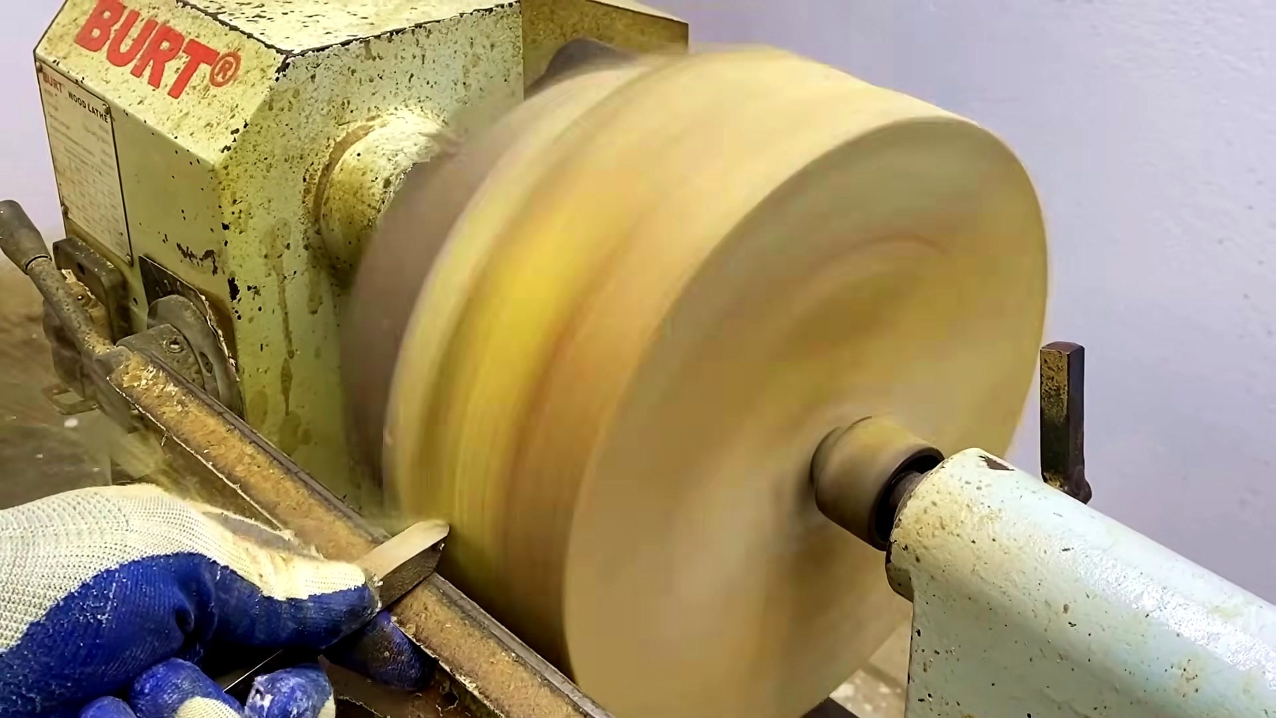homemade wood lathe bowl process - the blank spinning on the wood lathe as the outside profile develops