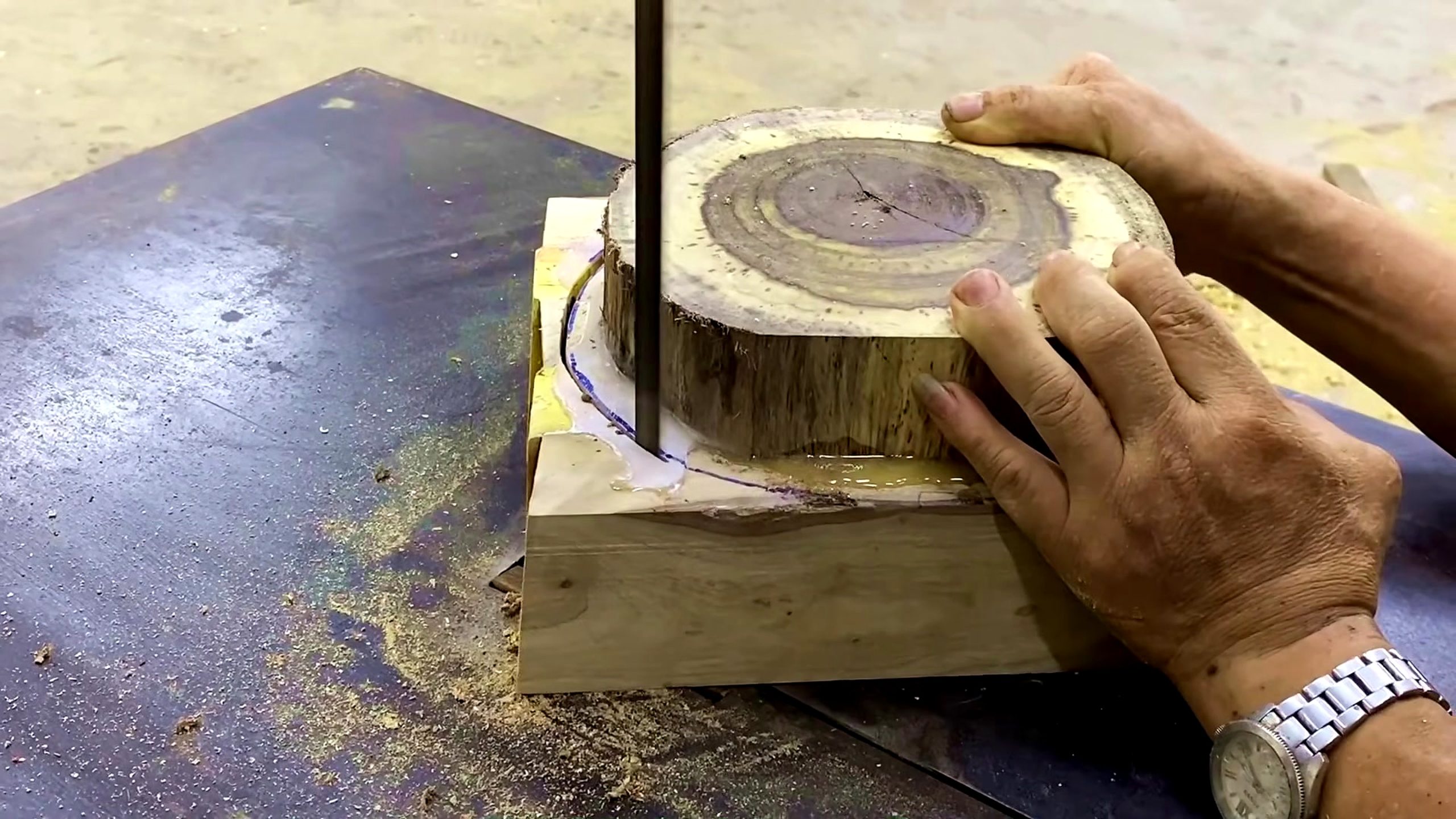 homemade wood lathe bowl process - the round insert and layout surface being checked on the bench