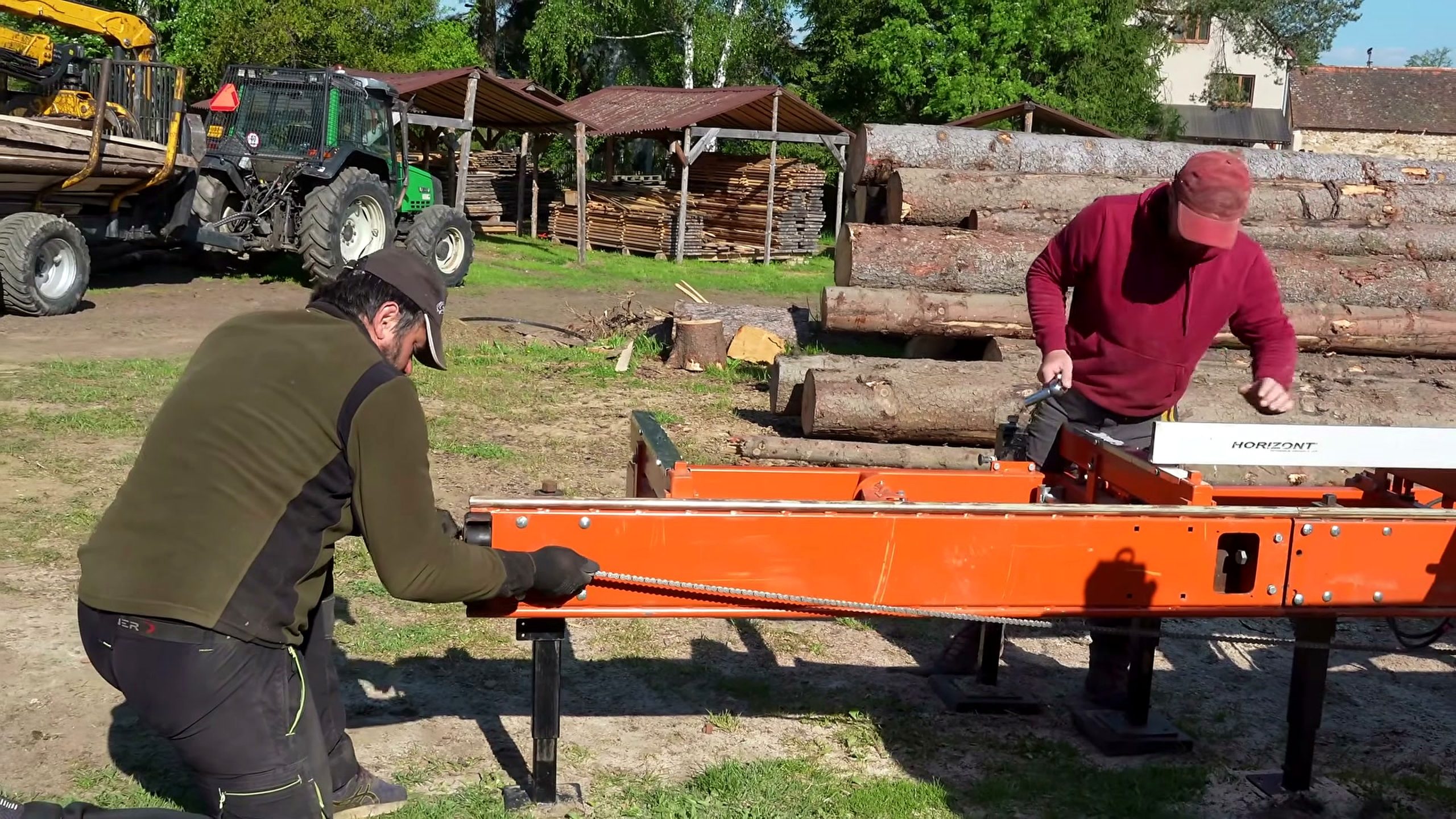 portable sawmill cuts massive meter tree - the setup or early workflow visible in the source video