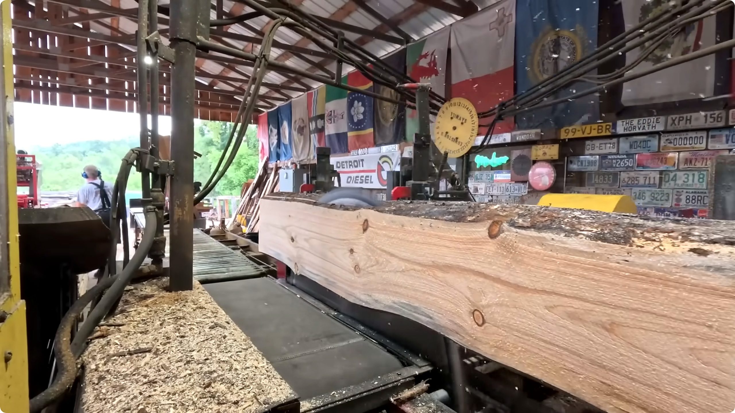 sawing six white pine logs 898 - the board handling and sorting stage after the main sawing passes