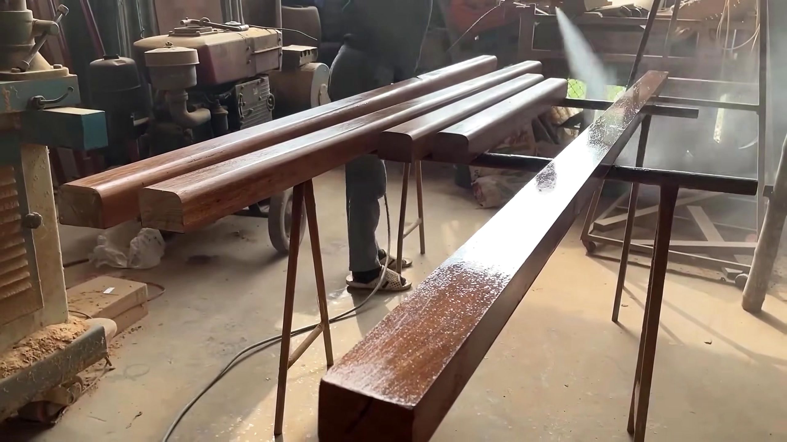 skilled woodworker crafts wooden stair railing - the main work stage that carries the video's practical lesson