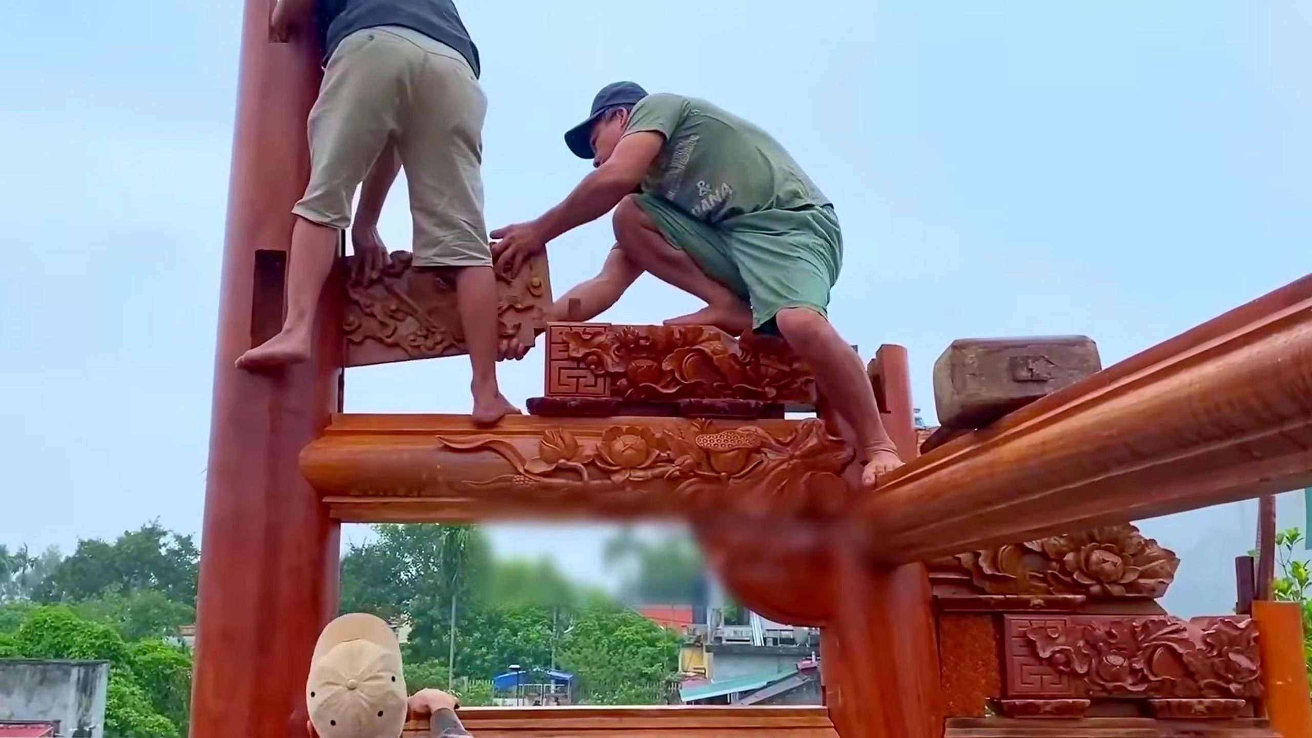 traditional timber frame mortise and tenon assembly - a carved beam connection being checked from temporary access at the post head