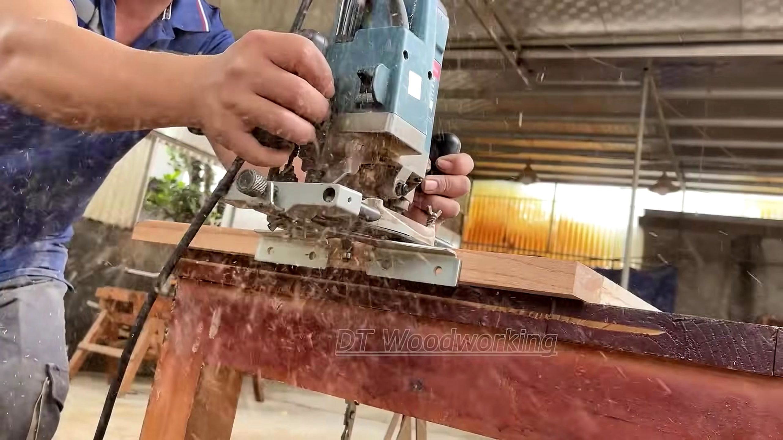 redwood panel mortise and bandsaw furniture workflow - router-guided edge machining on reddish-brown furniture stock