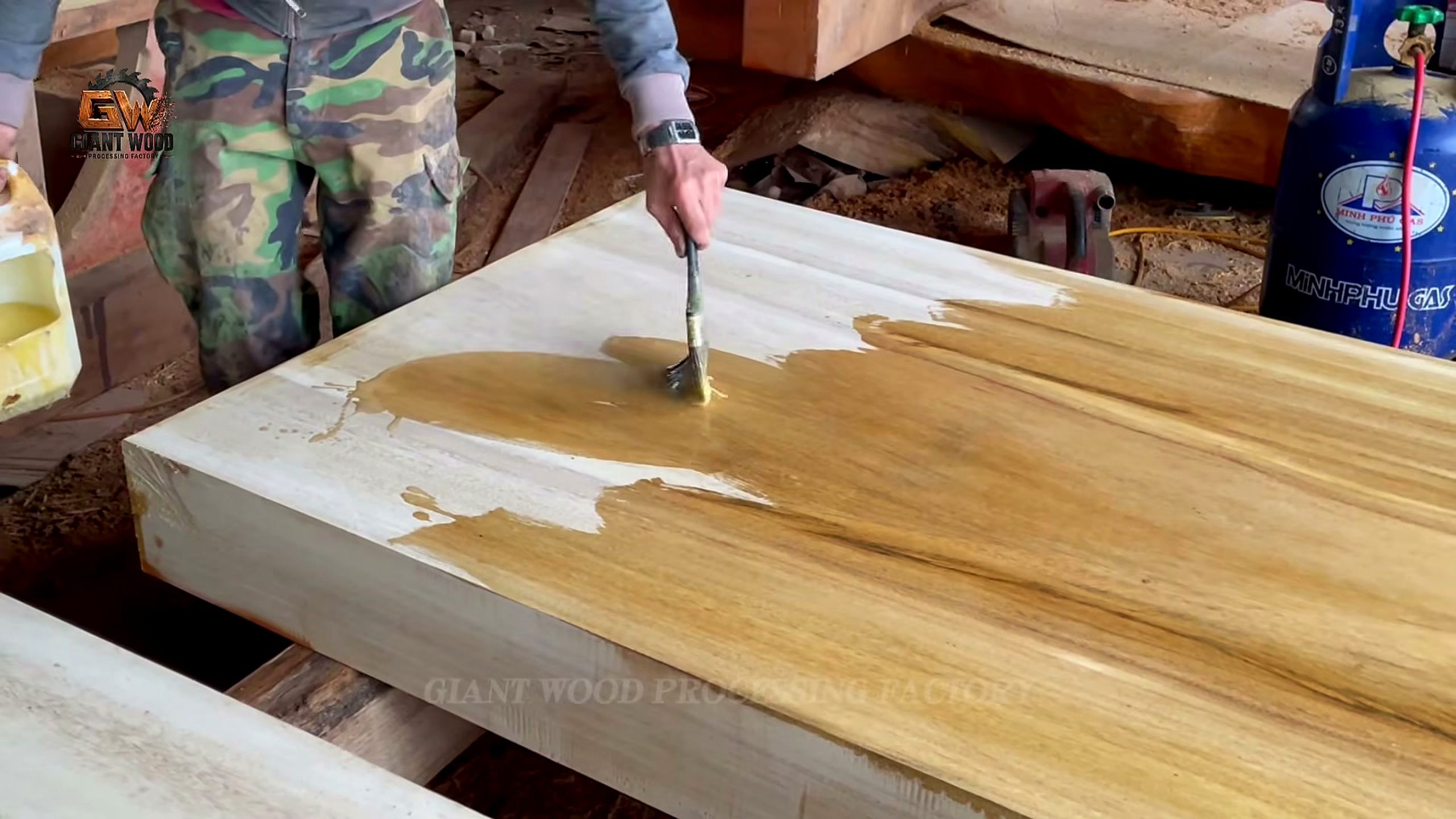 giant log - a detail-check moment that helps readers inspect the process