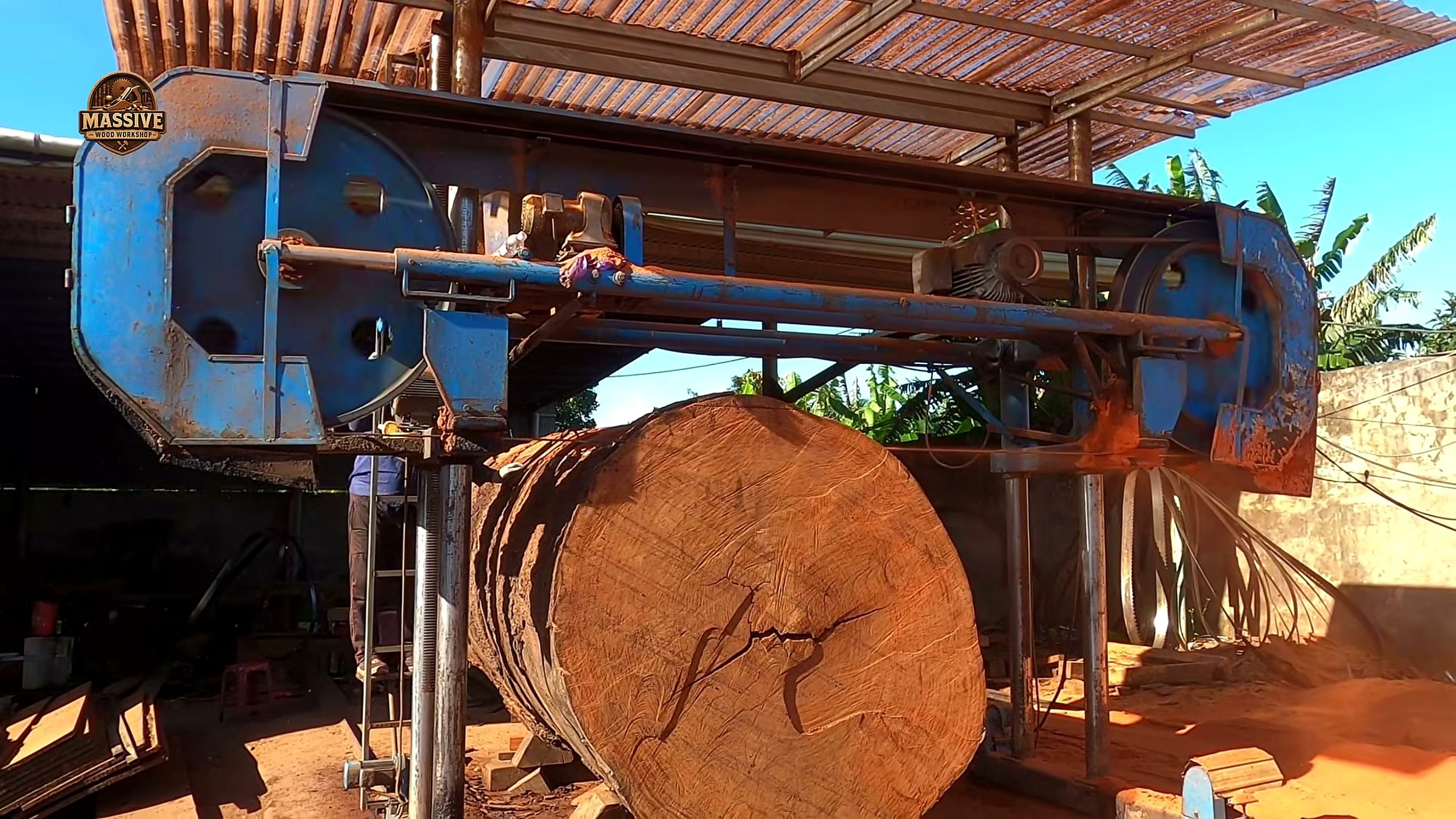 industrial sawmill - a close inspection moment after the main cut