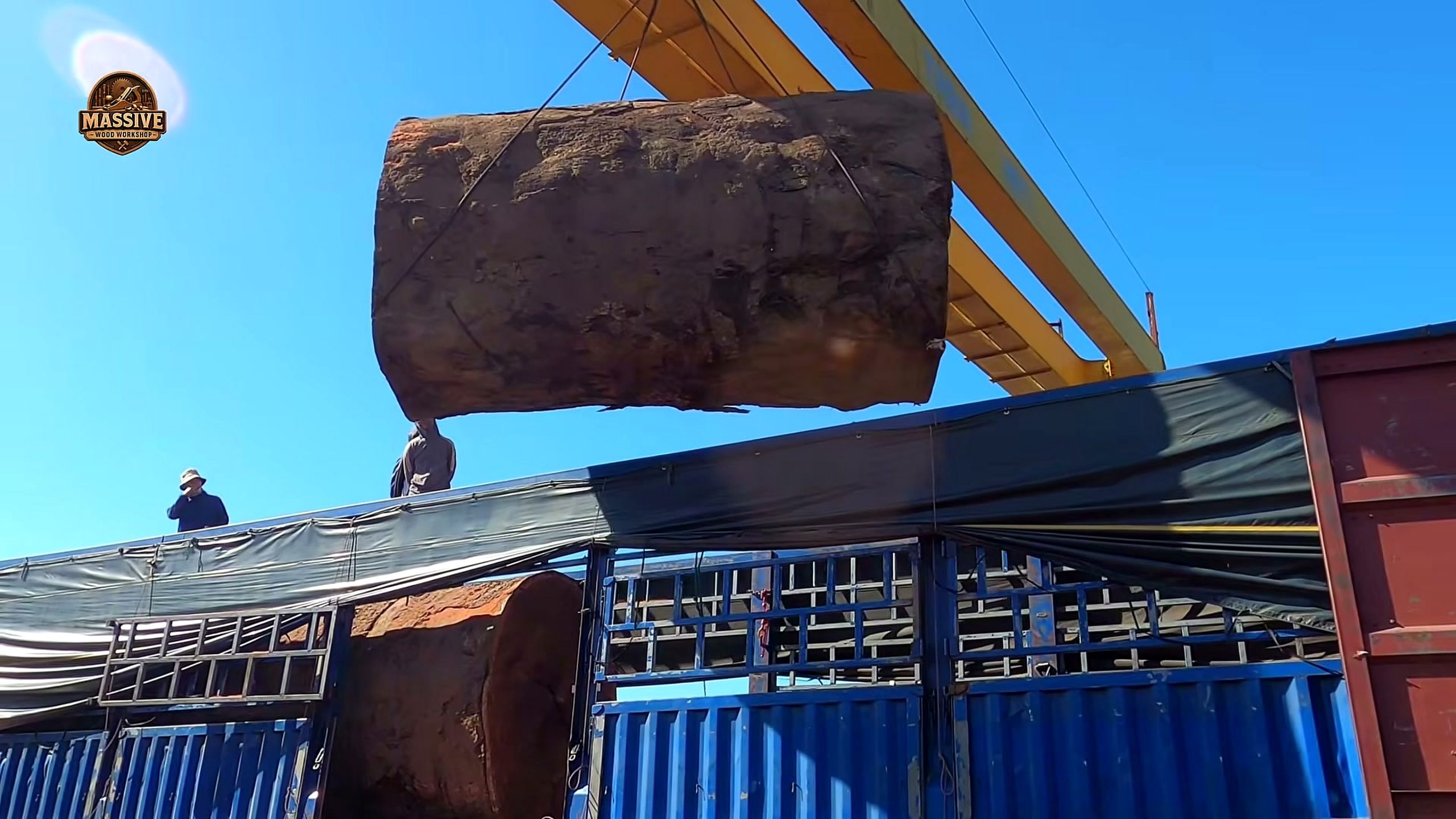 industrial sawmill - the timber staged before the first industrial sawmill pass