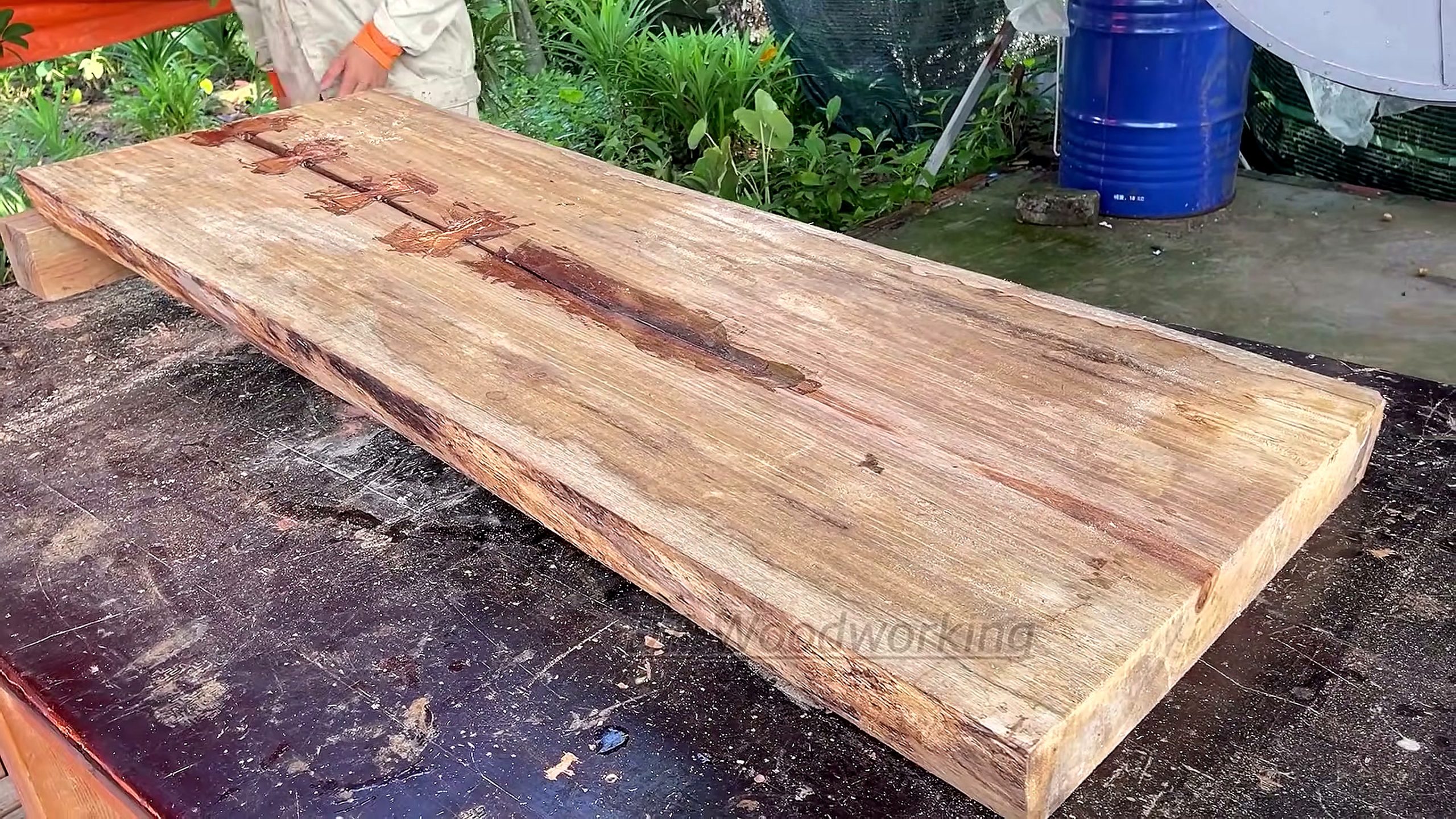 solid black wood slab - a detail-check moment that helps readers inspect the process