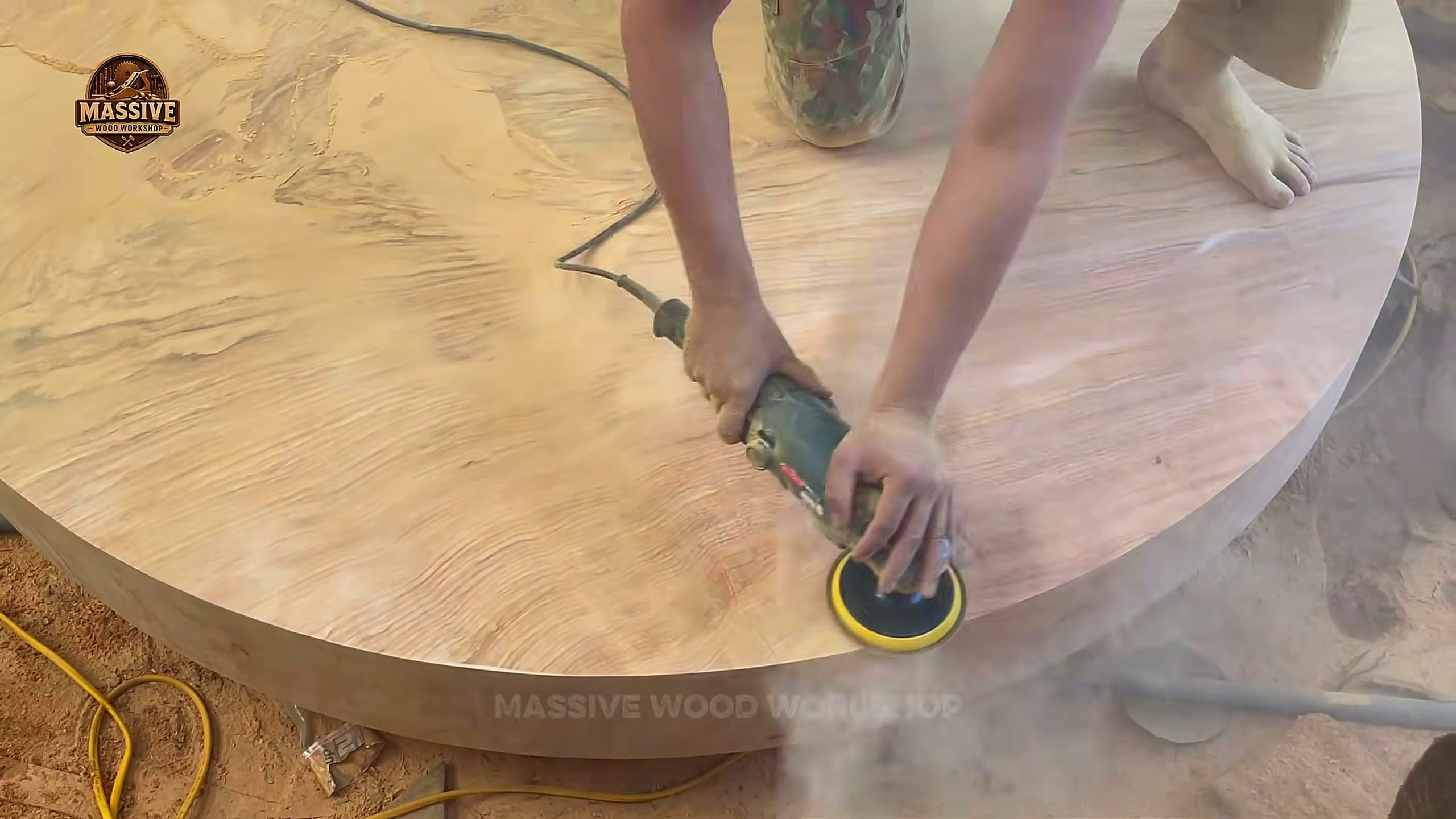 dangerous tree round wooden top being sanded after rough cutting